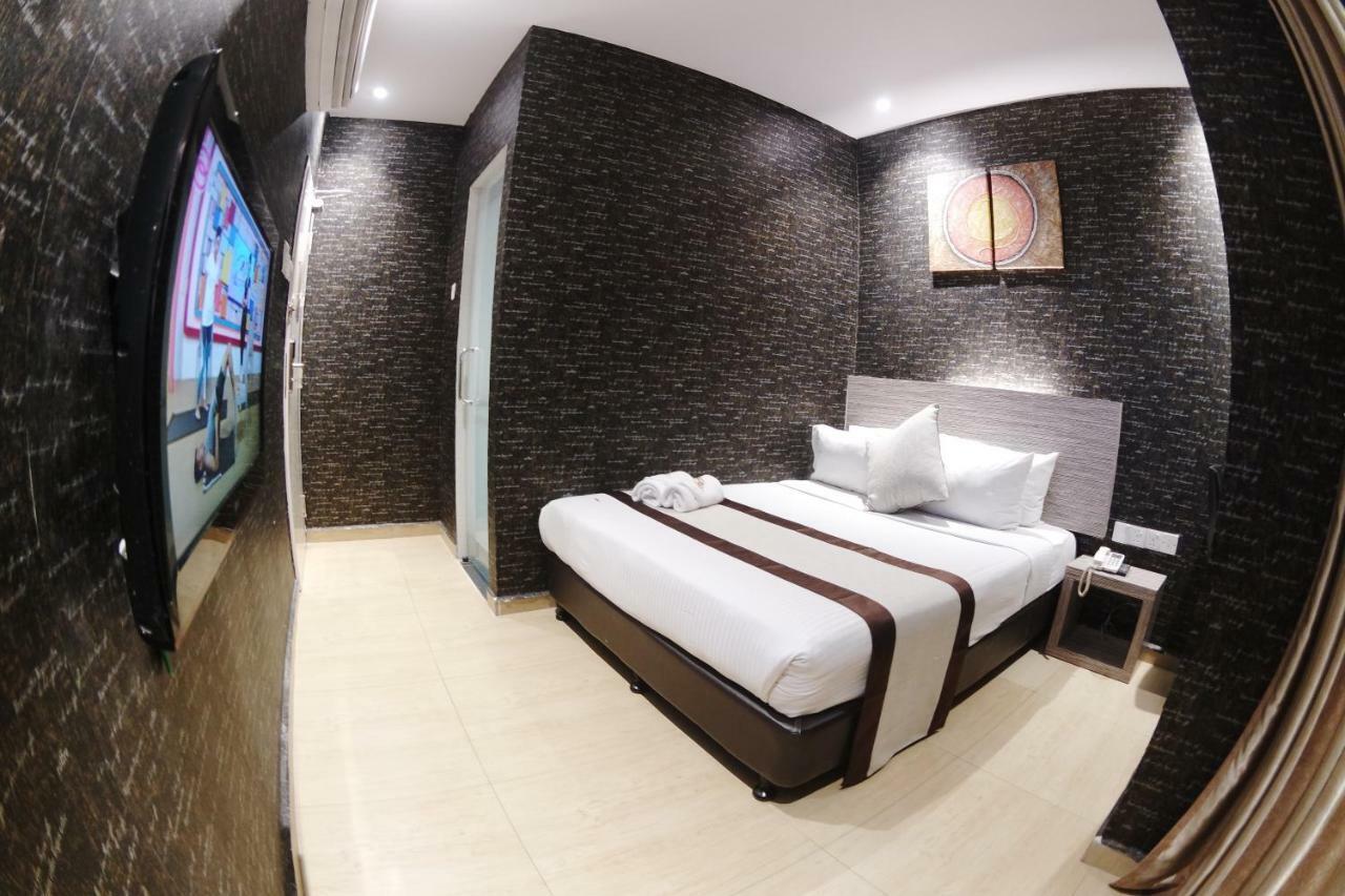 Here Hotel Skudai Bagian luar foto
